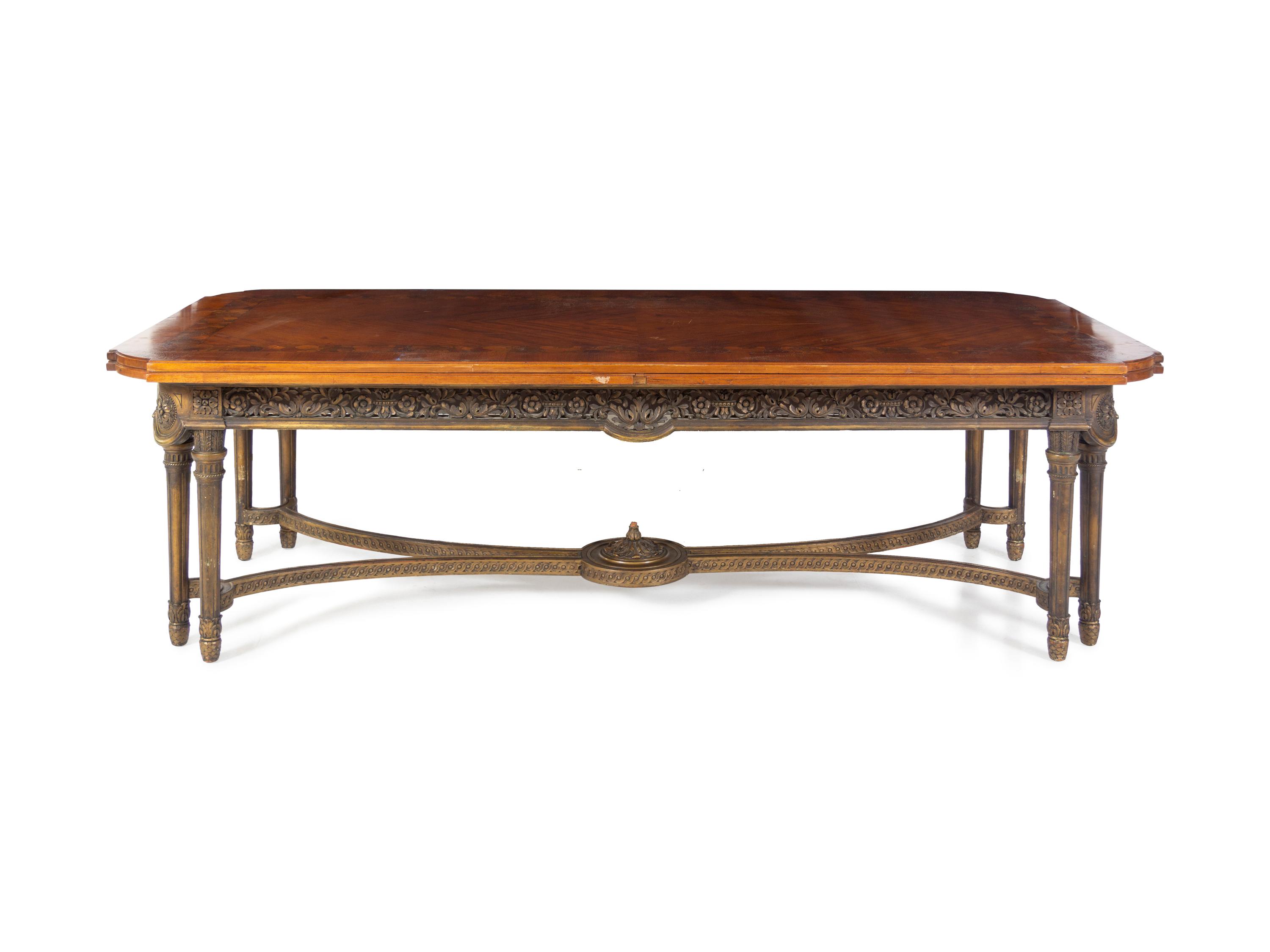 A Louis XVI Style Marquetry Dining Table