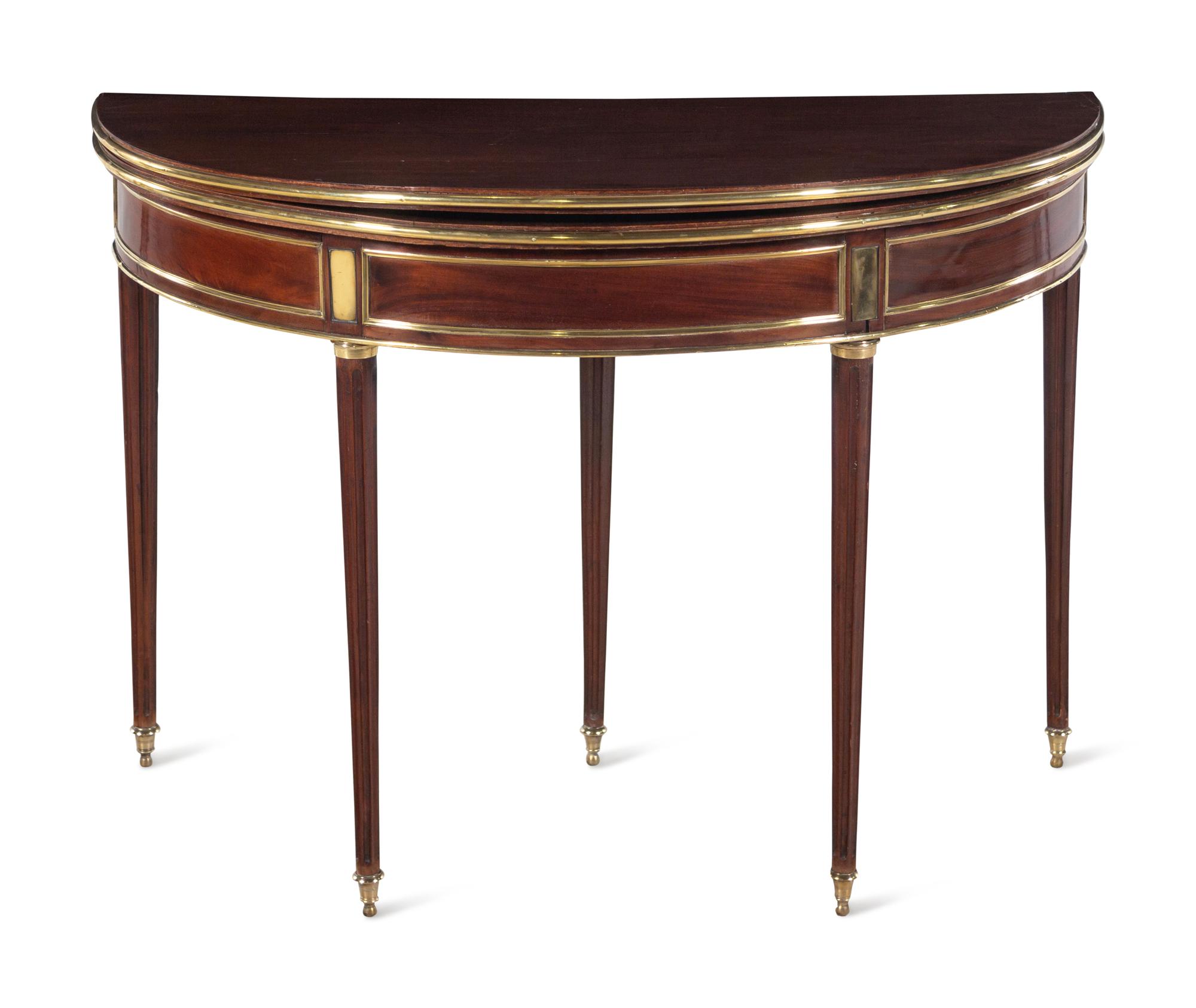 A Louis XVI Brass Mounted Mahogany Flip-Top Pier Table