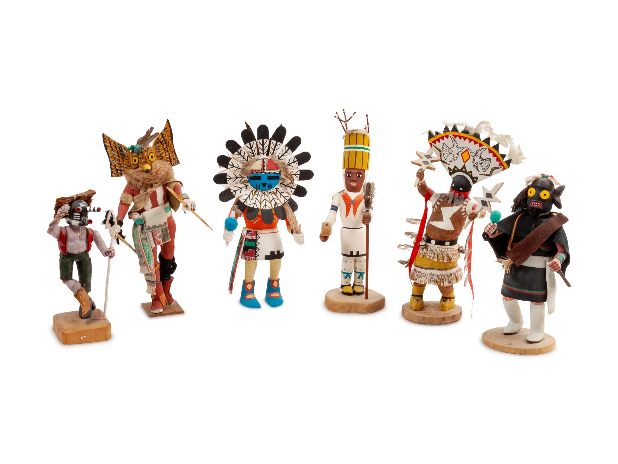 Collection of Hopi Katsinas and Apache Carvings