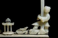 An Edward I. Farmer White Jade and Silver Mounted Chinoiserie Desk Clock, Circa 1930 Edward I. Farmer約1930年製中國風白玉童子座鐘