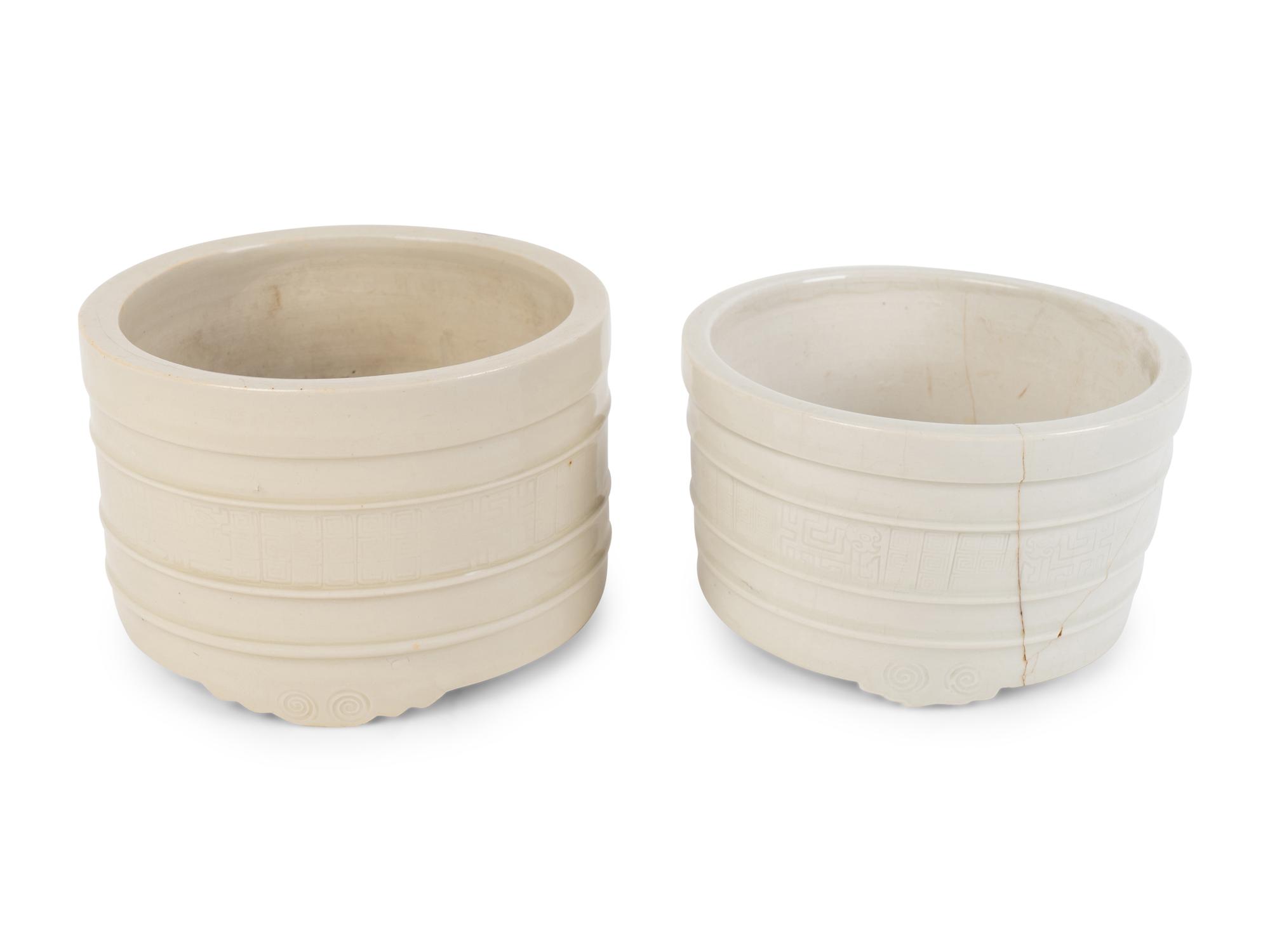 A Pair of Chinese Blanc de Chine Lian-form Porcelain Tripod Censers — QING DYNASTY
