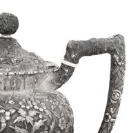An American Silver Repoussé Three-Piece Coffee Service