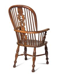 An Assembled Set of Nine Yew, Elm and Beechwood Windsor Armchairs