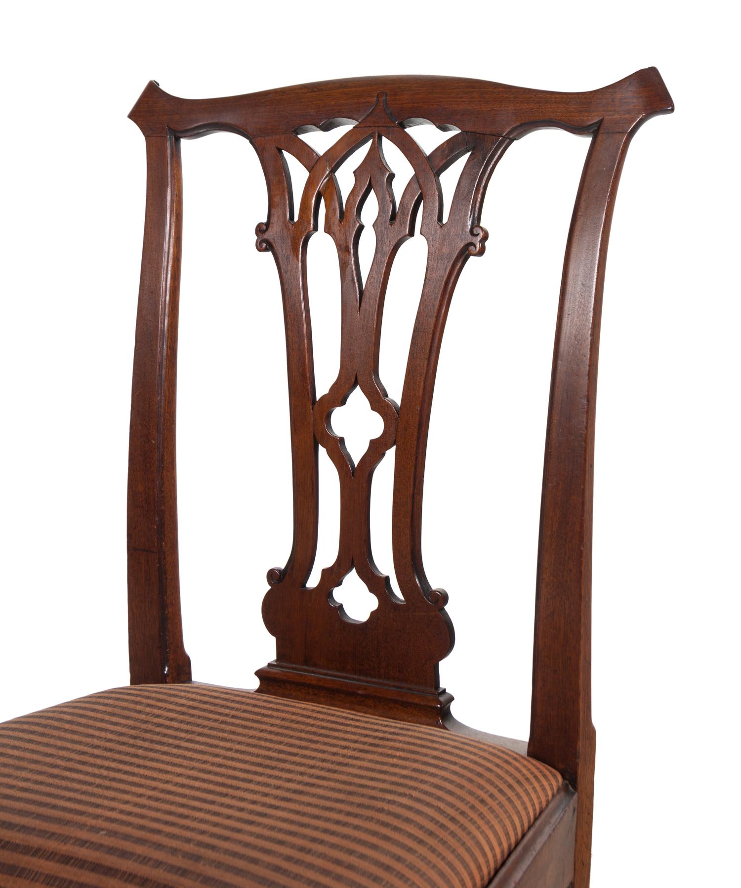 A Set of Eight George III Mahogany Dining Chairs in the Chippendale Taste