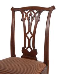 A Set of Eight George III Mahogany Dining Chairs in the Chippendale Taste