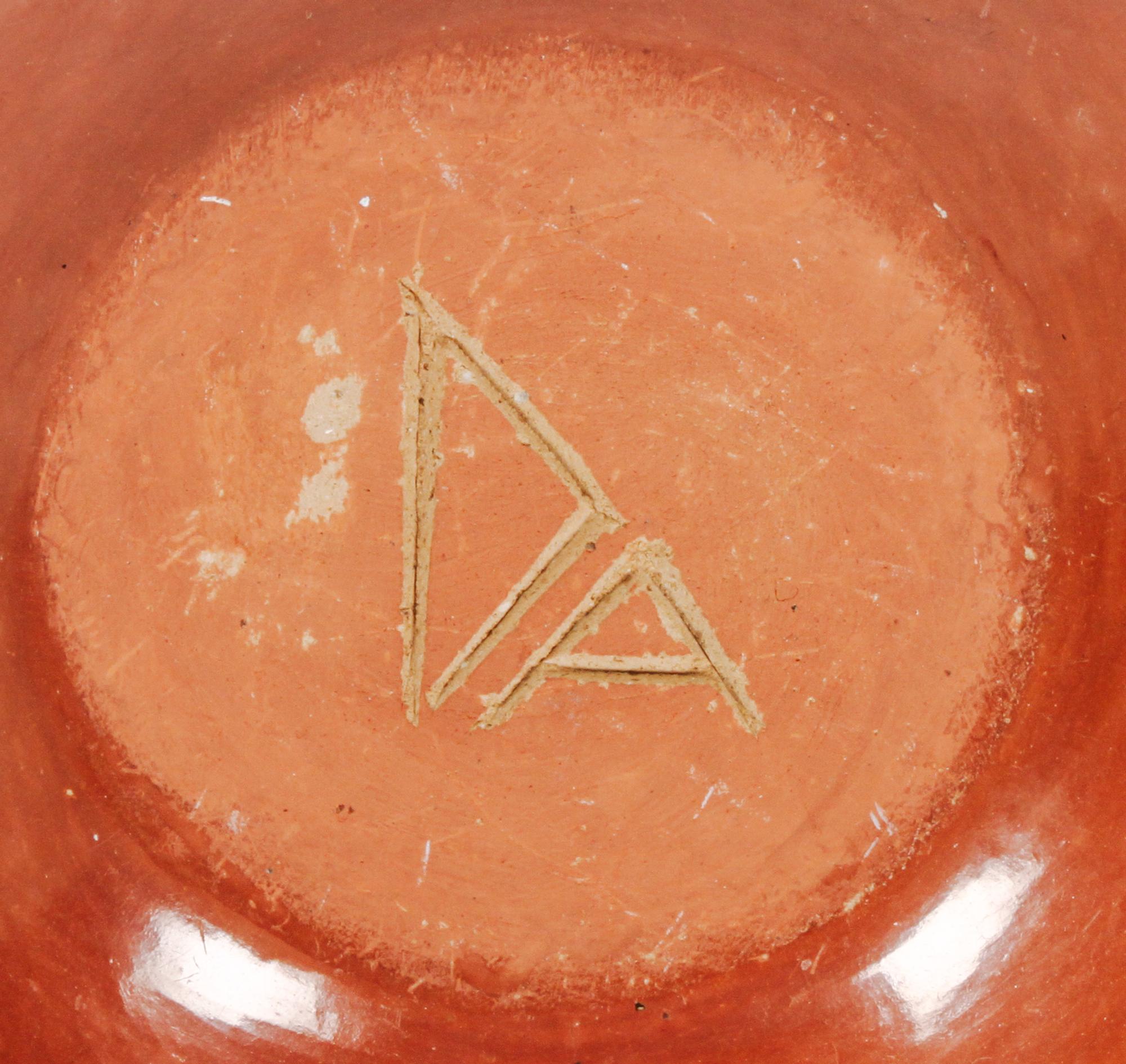 Tony Da (1940-2008), San Ildefonso Height 2 1/2 x diameter 4 1/2 inches.