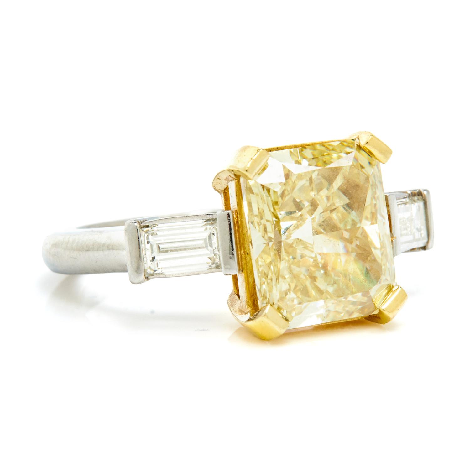 FANCY YELLOW DIAMOND AND DIAMOND RING
