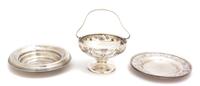 Four American Silver Articles, Various Makers, comprising a J. E. Caldwell small bowl, a Whiting footed bowl with fixed handle, and two