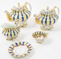 A Continental Porcelain Tea Service Width of teapot 10 inches. — EARLY 20TH CENTURY