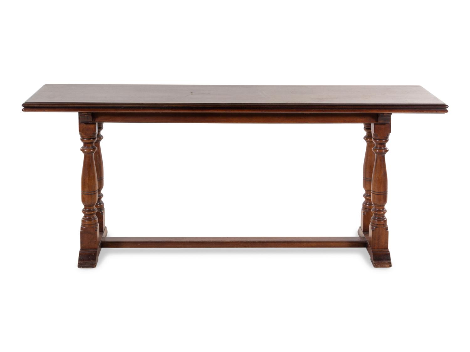 A Baroque Style Mahogany Extension Library Table