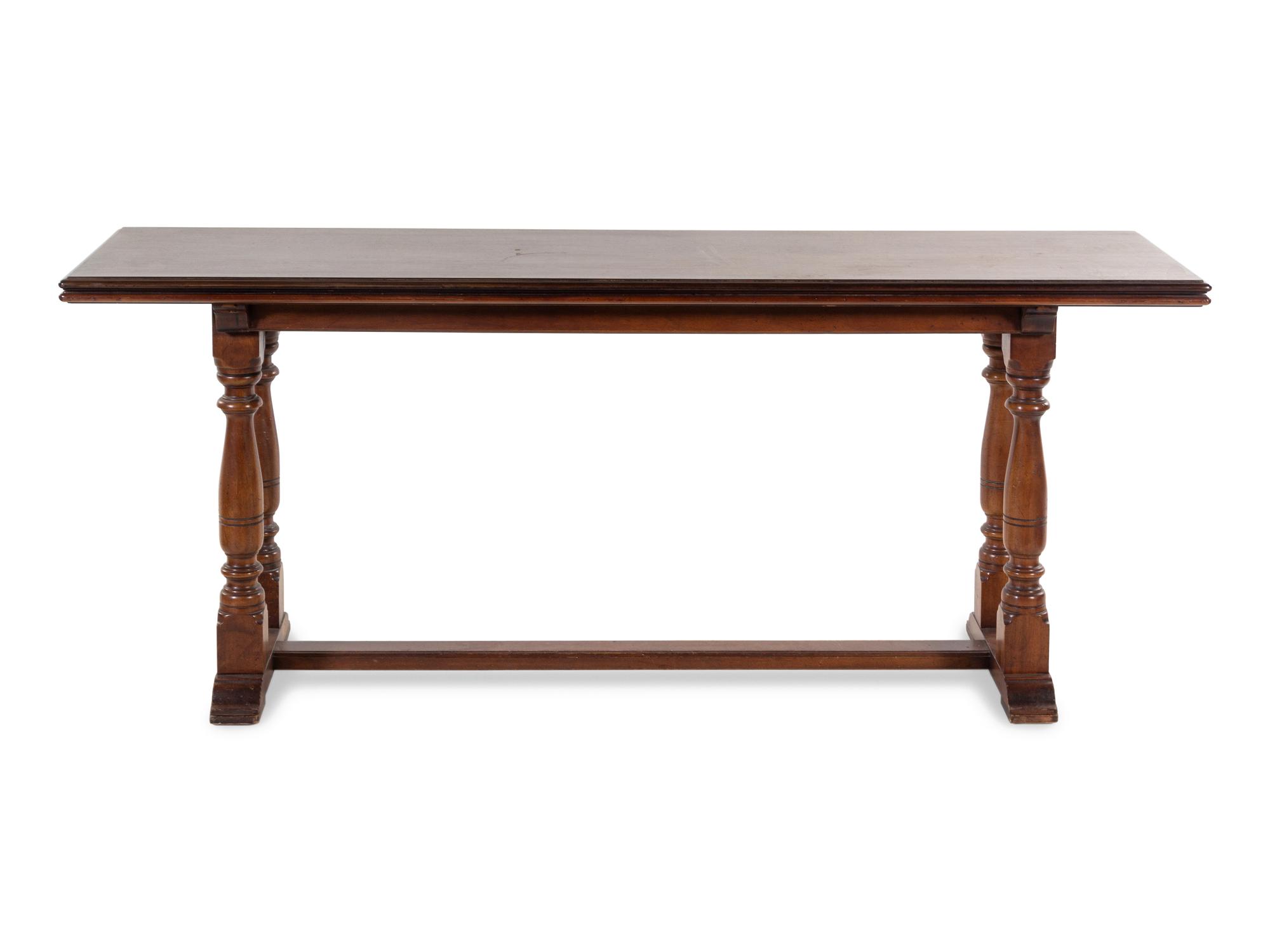 A Baroque Style Mahogany Extension Library Table