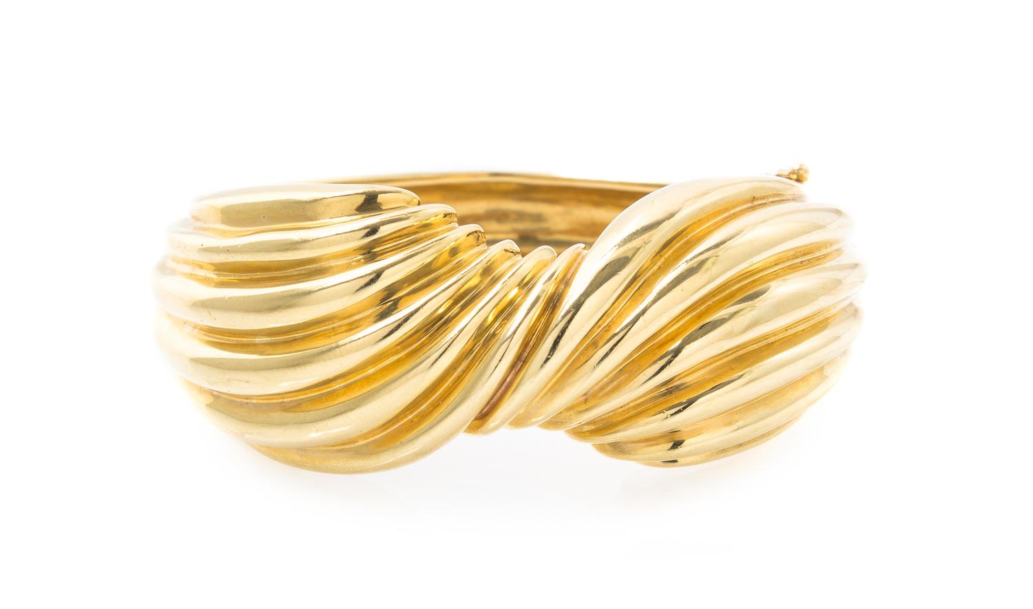 A 14 Karat Yellow Gold Hinged Bangle Bracelet, 40.80 dwts.