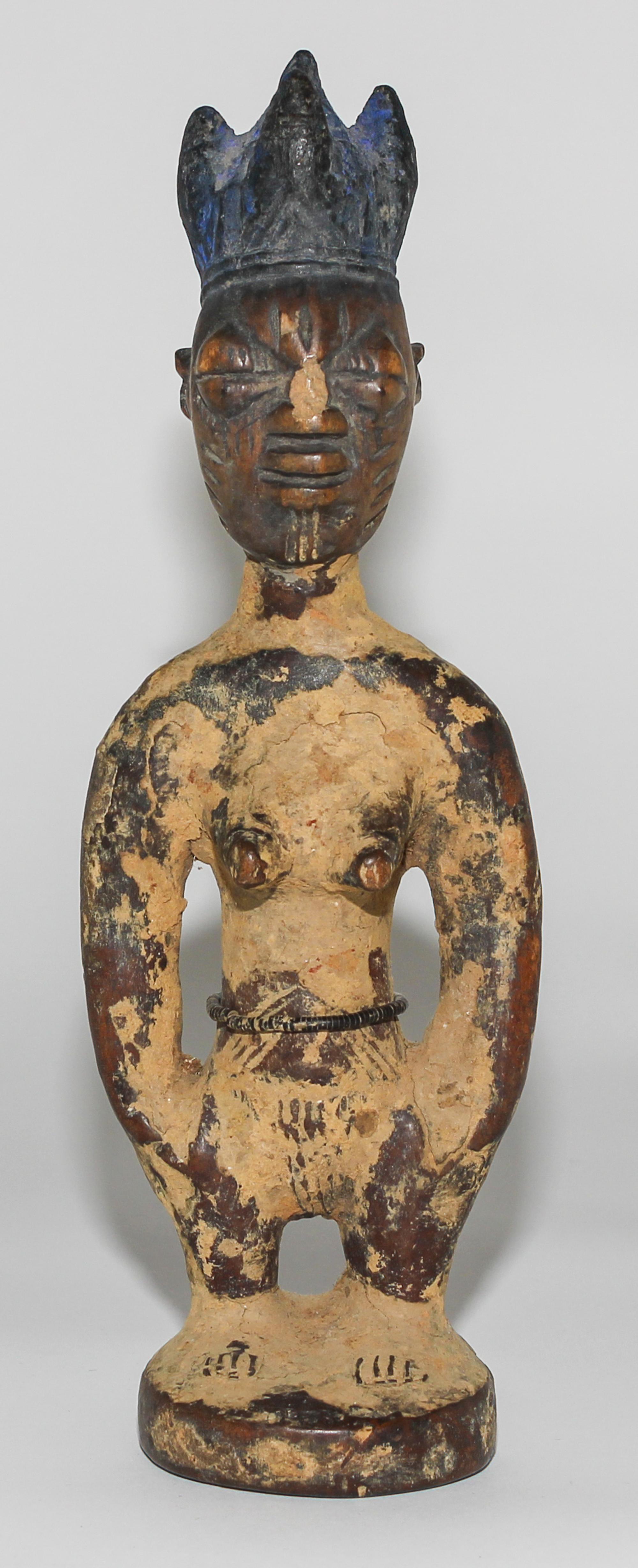 A Yoruba Wood Ibeiji Finial. Height 10 3/4 inches.