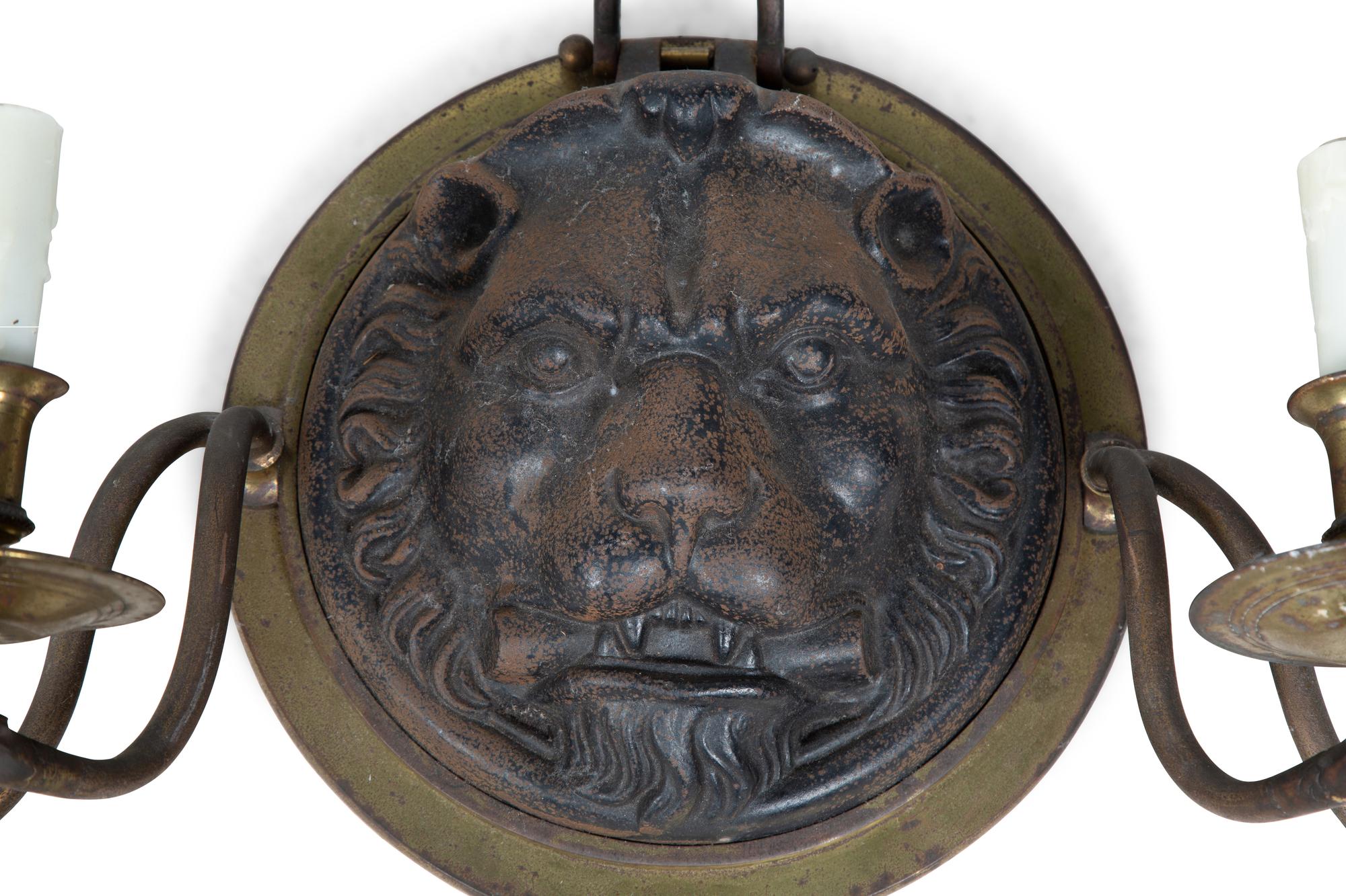 A Pair of Regency Style Iron and Brass Sconces with Lion Masks and Serpent Branches — 19TH CENTURY