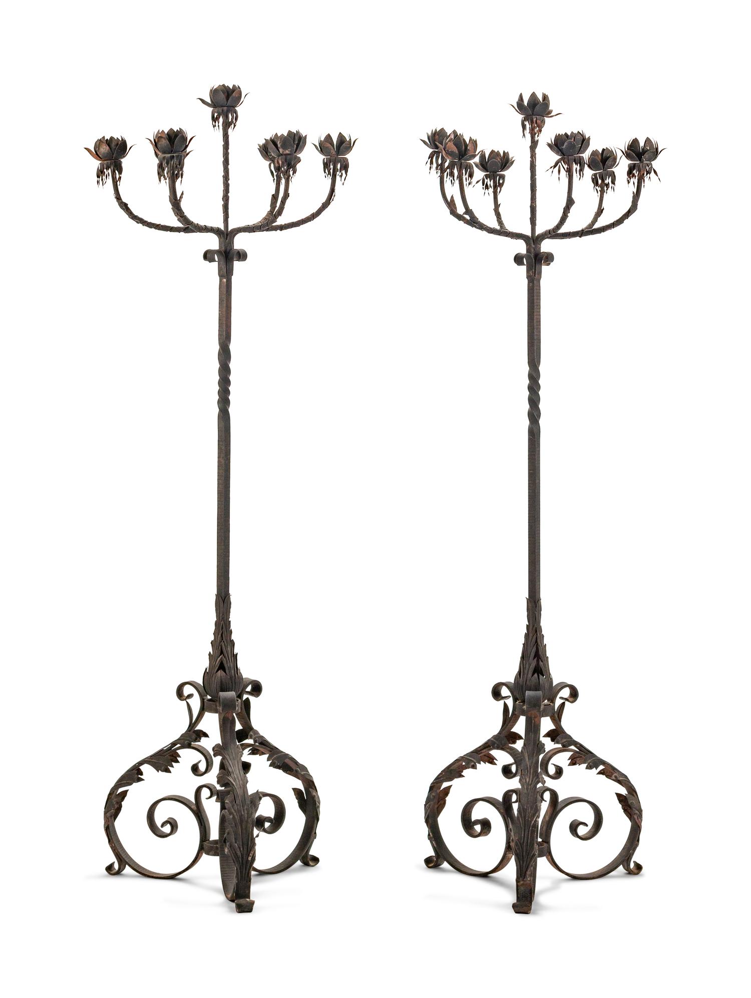 A Pair of Spanish Baroque Style Wrought-Iron and Tole Floor Standing Torcheres