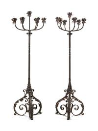 A Pair of Spanish Baroque Style Wrought-Iron and Tole Floor Standing Torcheres