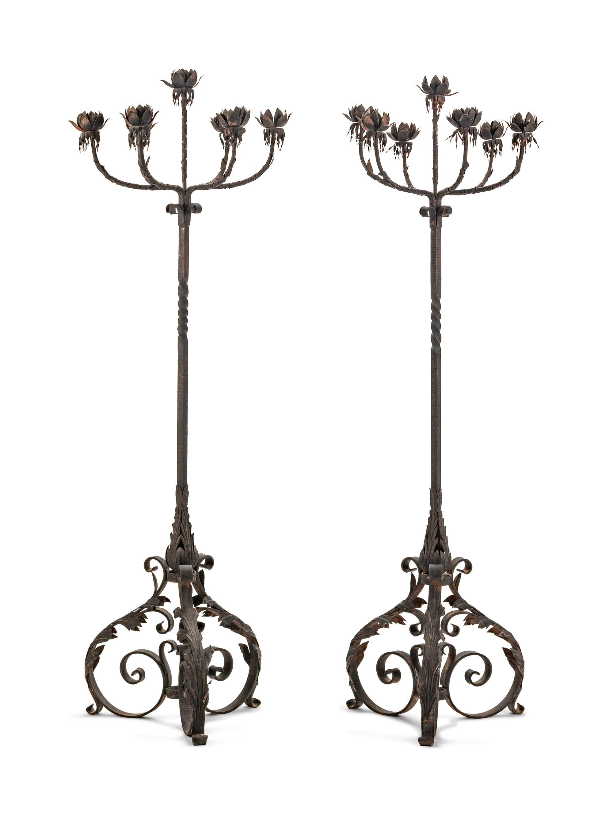 A Pair of Spanish Baroque Style Wrought-Iron and Tole Floor Standing Torcheres