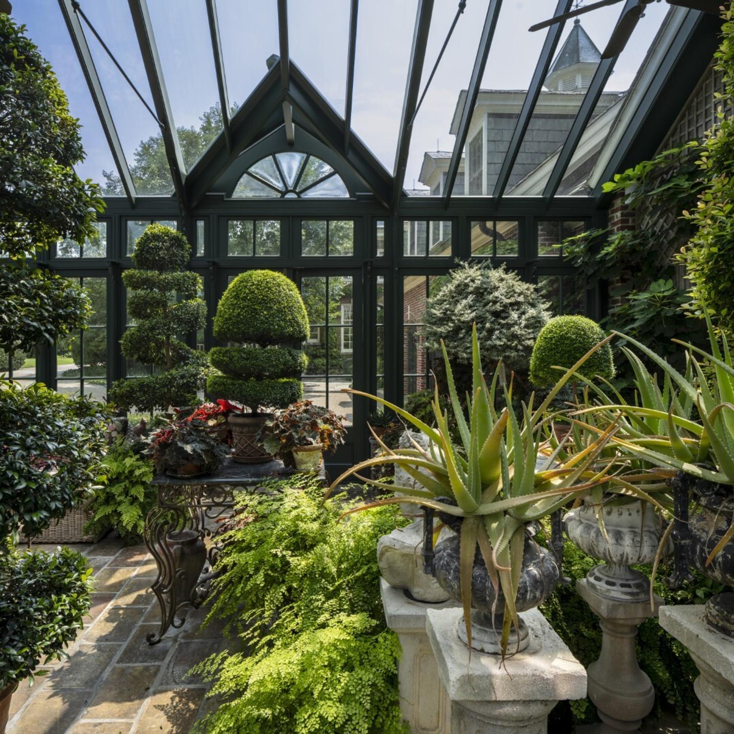 A Pair of Georgian Style Japanned Mirrors