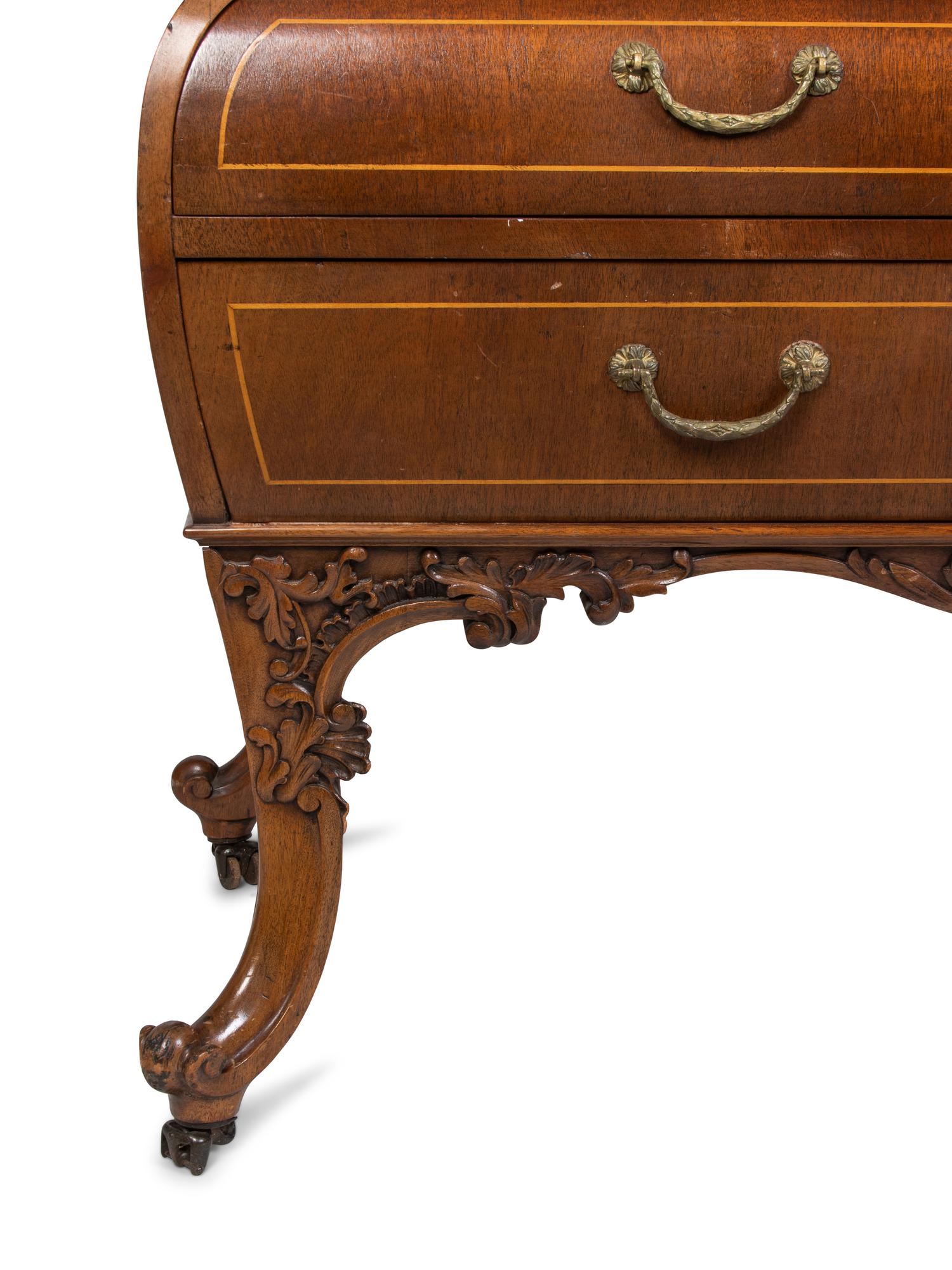 A Louis XV Style Walnut Bombe Commode