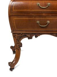 A Louis XV Style Walnut Bombe Commode