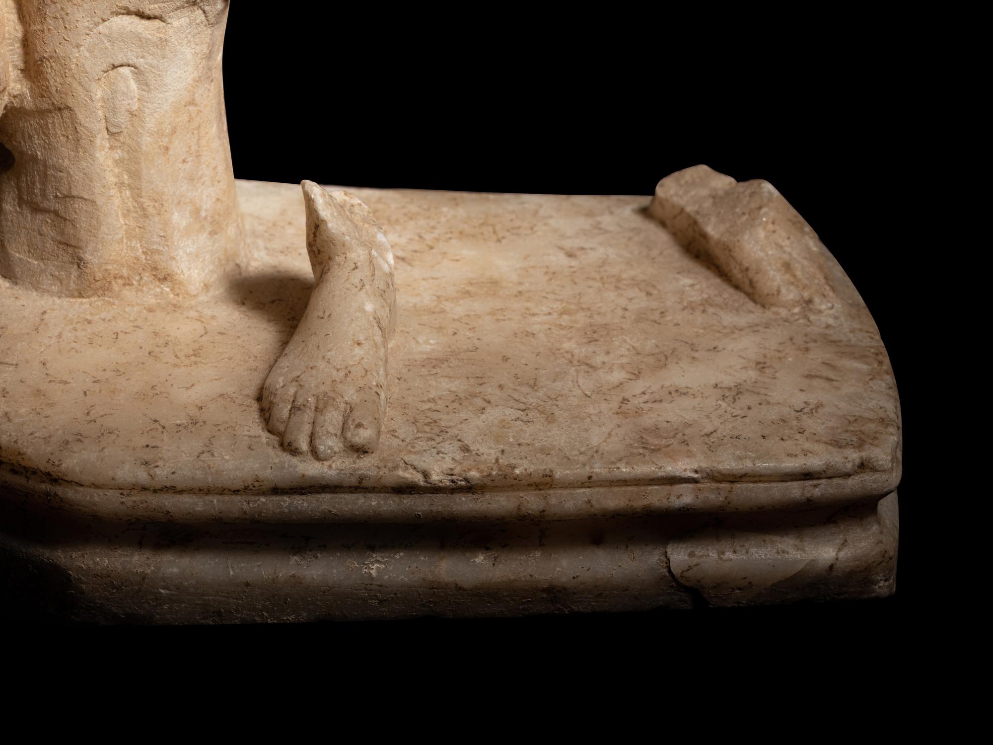 A Roman Marble Sculpture Base with a Ram