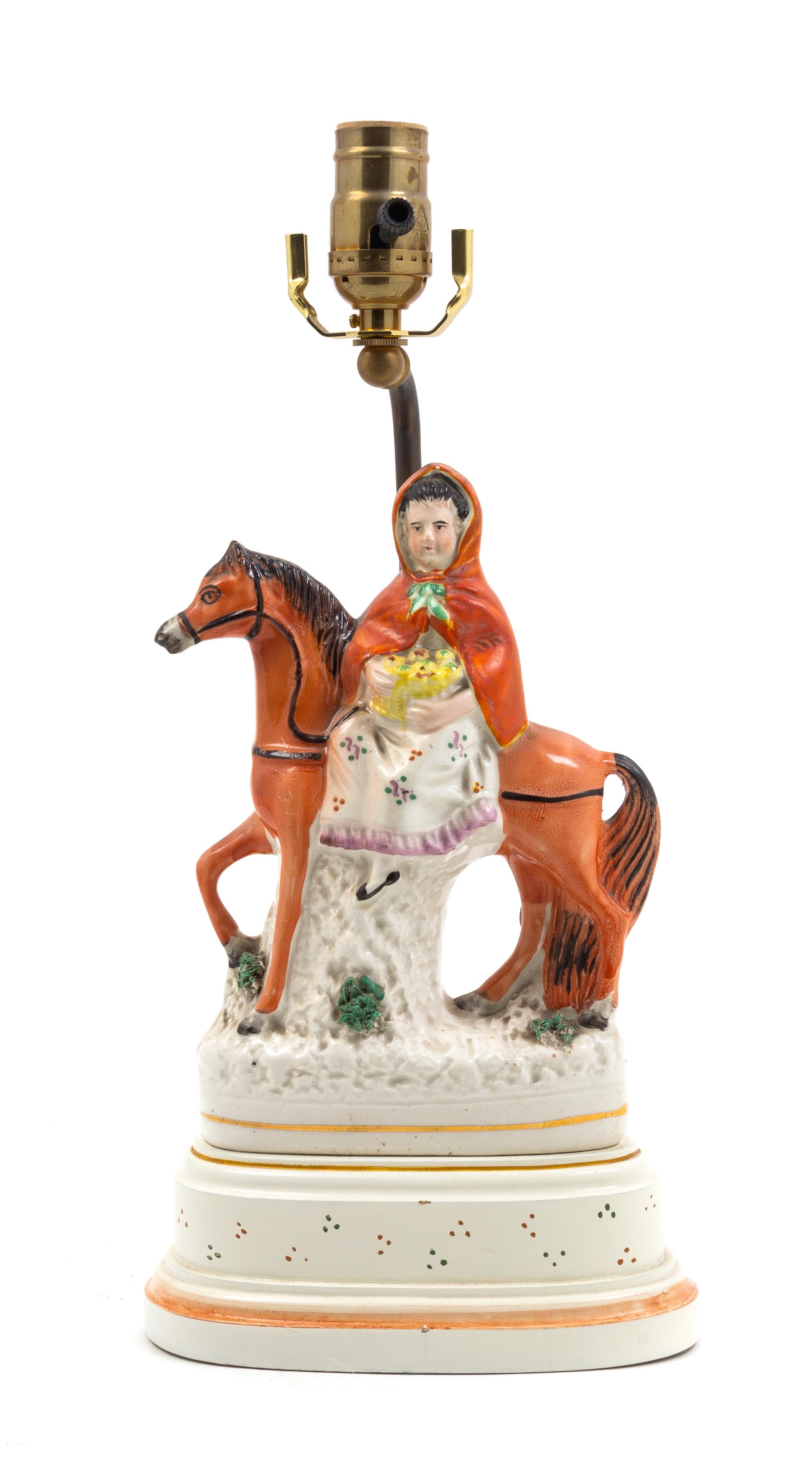 A Staffordshire Figural Group
