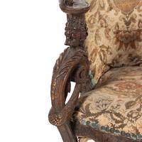 An Italian Carved Walnut Corner Chair