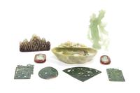 A Collection of Carved Hardstone Articles Height of tallest 7 1/4 inches.