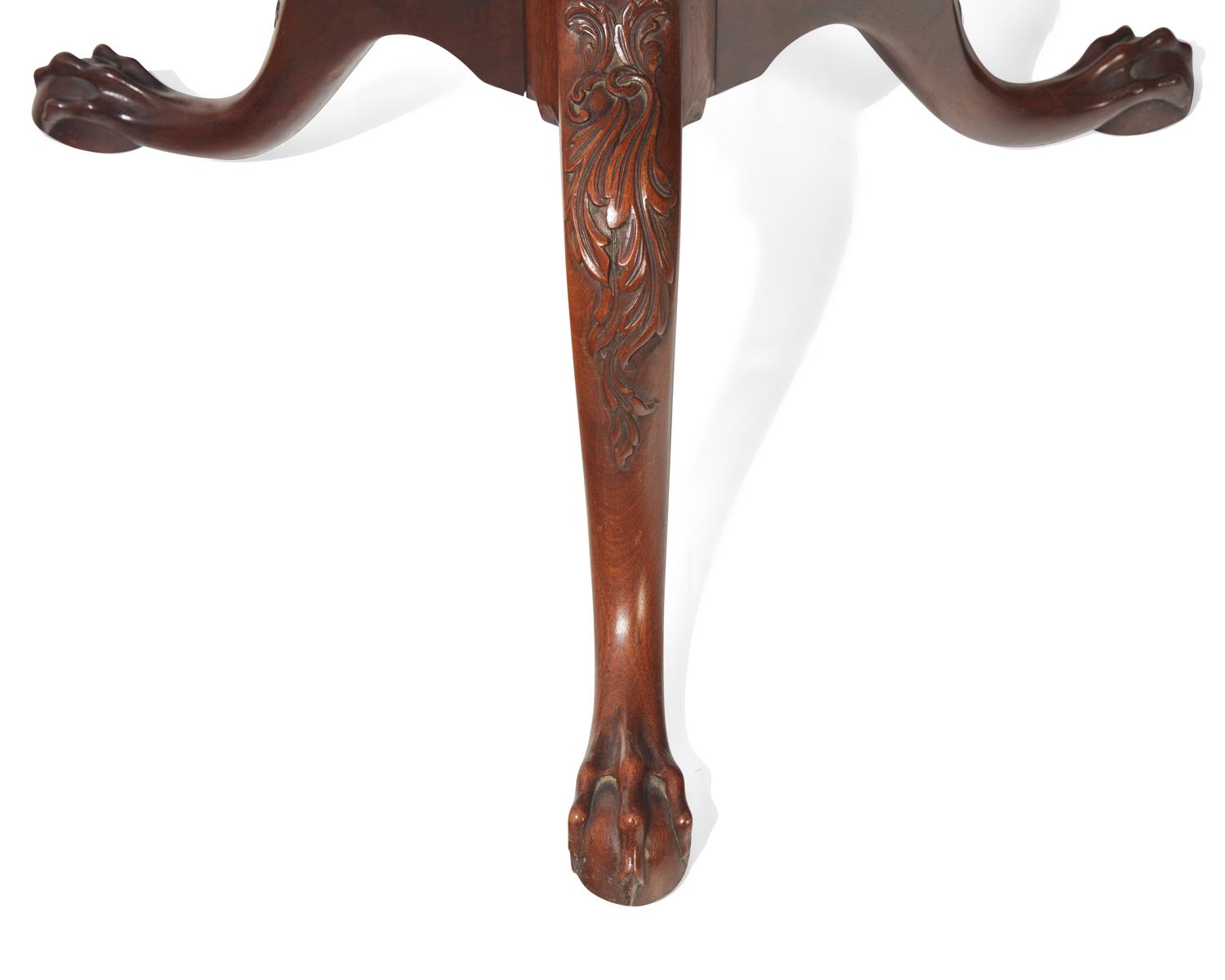 A George III carved mahogany tilt-top tea table, 18th / 19th century