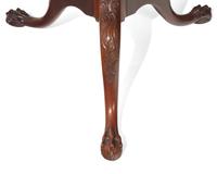 A George III carved mahogany tilt-top tea table, 18th / 19th century