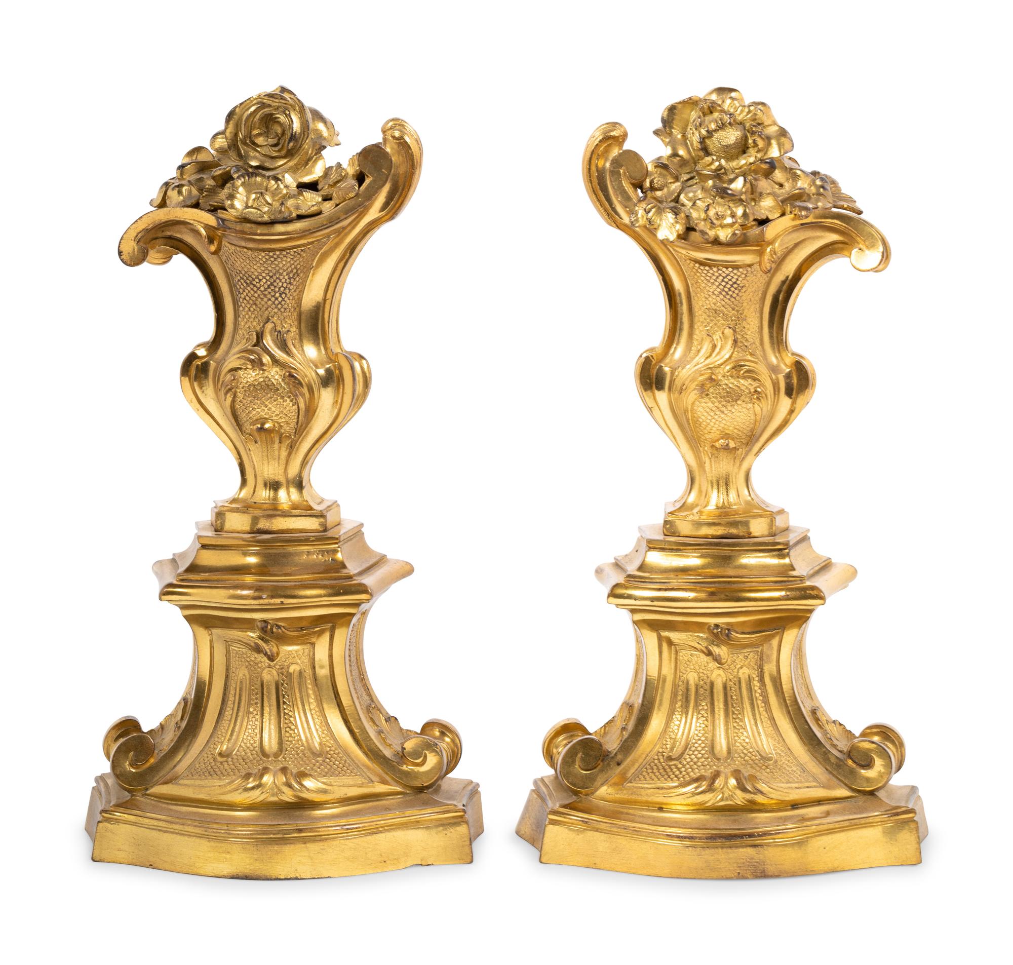 A Pair of Régence Style Gilt Bronze Chenets