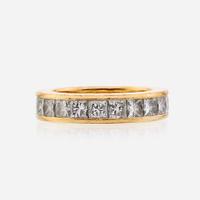 An eighteen karat gold and diamond eternity band