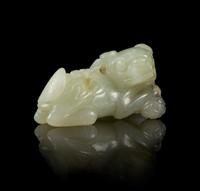 A Pale Celadon Jade Figure of a Fu Lion Length 1 7/8 inches. — 18TH/19TH CENTURY