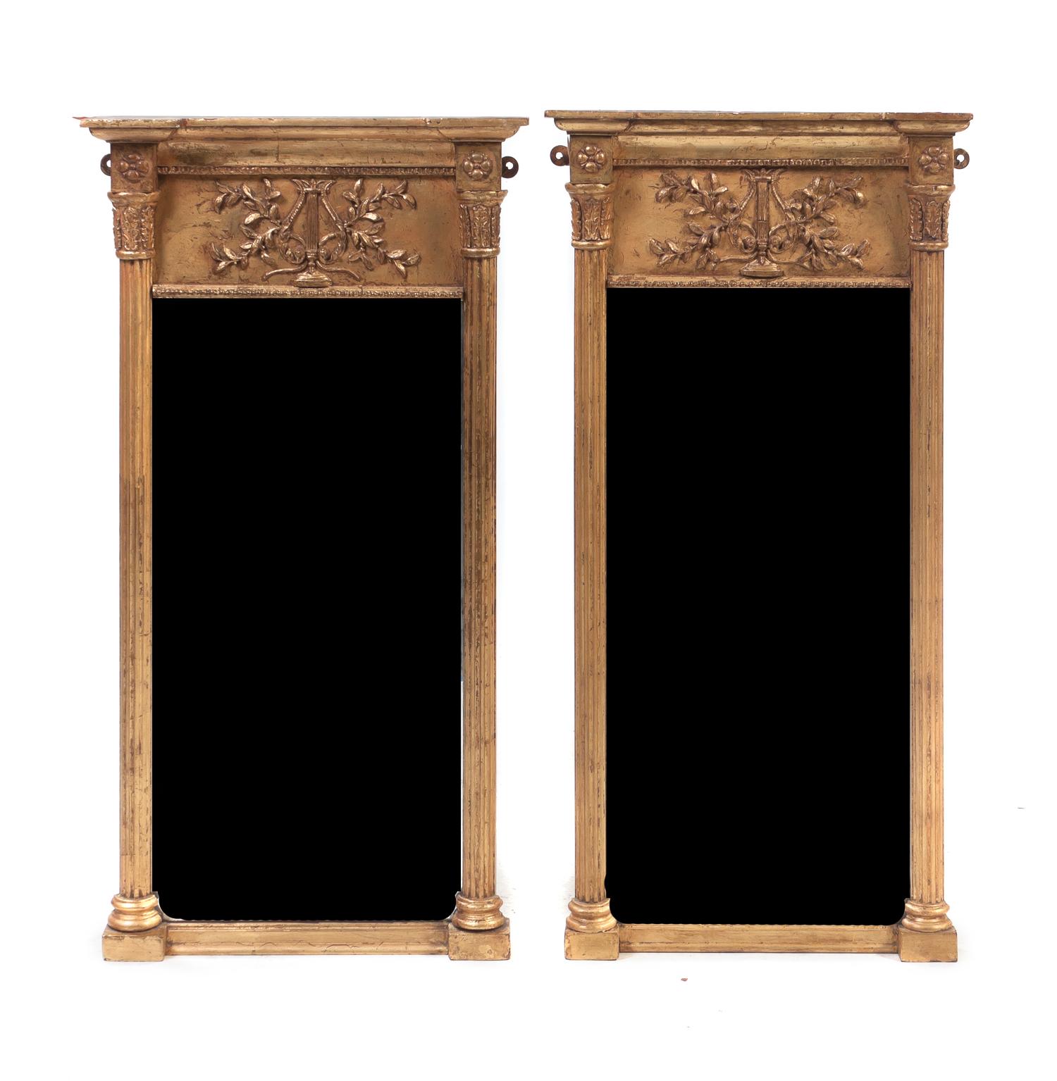 A Pair of American Federal Giltwood Mirrors, Height 31 1/2 x width 16 3/4 inches.