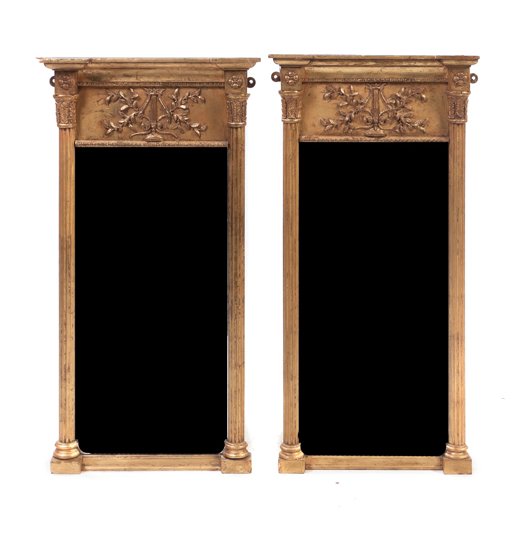 A Pair of American Federal Giltwood Mirrors, Height 31 1/2 x width 16 3/4 inches.