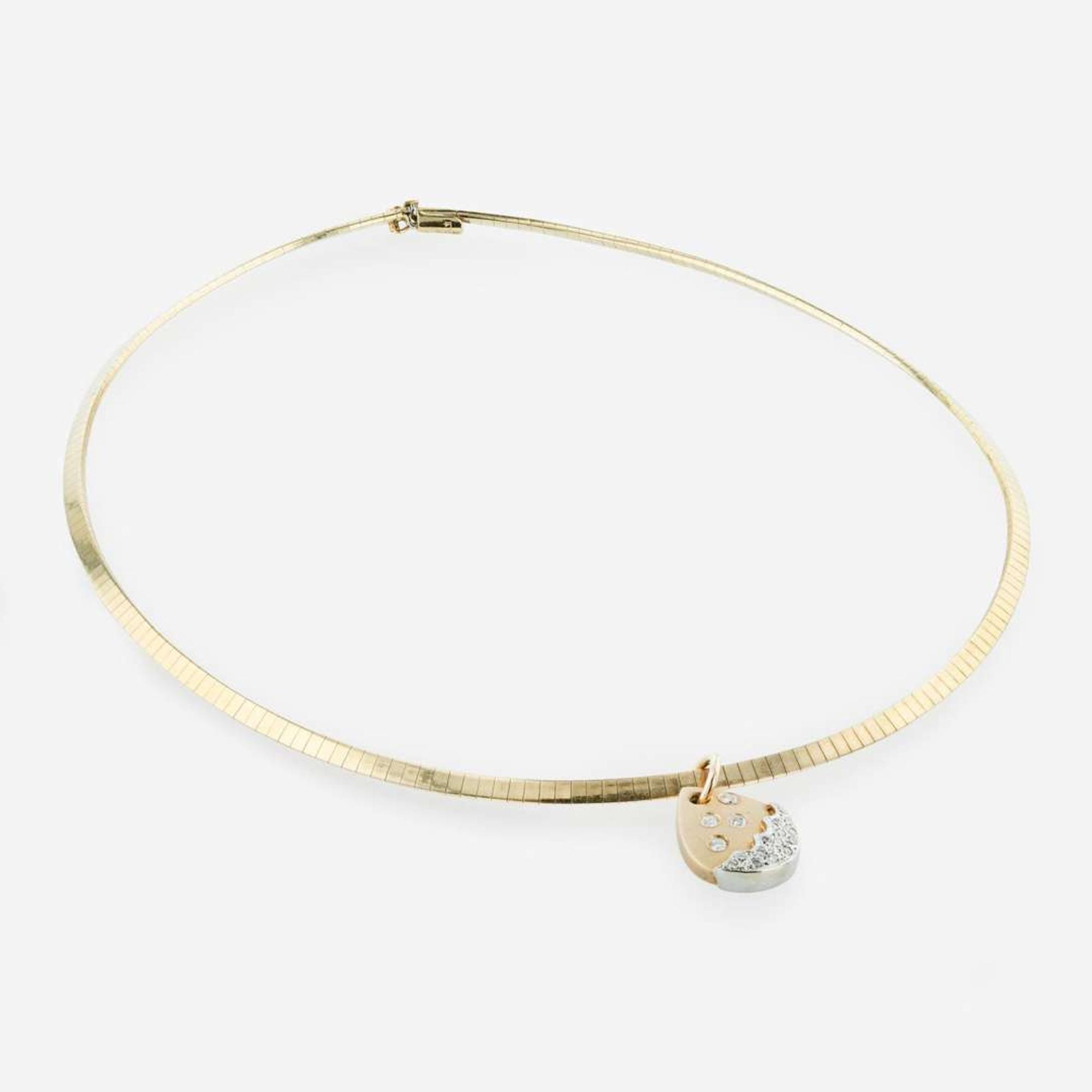 A Set of Two Yellow Gold Omega Necklaces and Charms