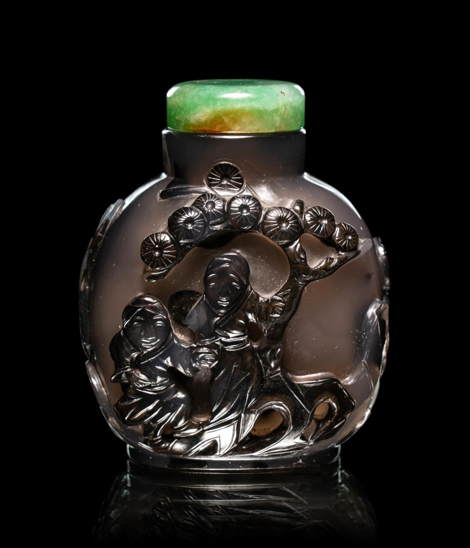 Two Carved Agate 'Fu Lion' Snuff Bottles