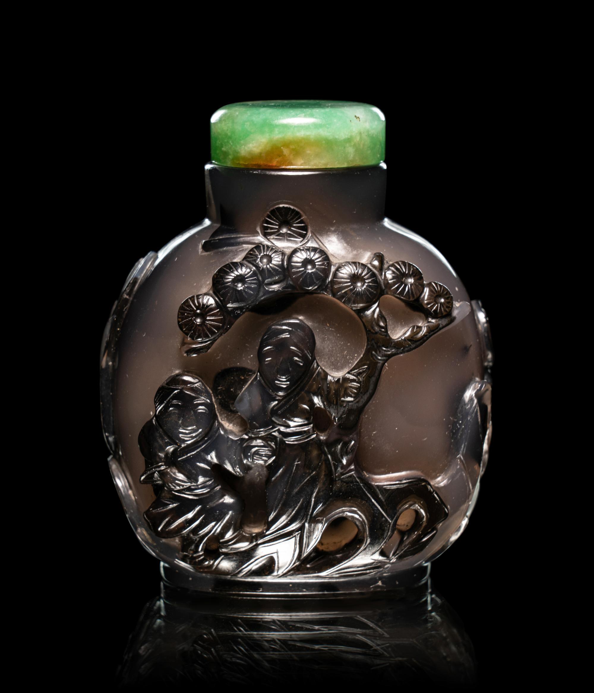 Two Carved Agate 'Fu Lion' Snuff Bottles