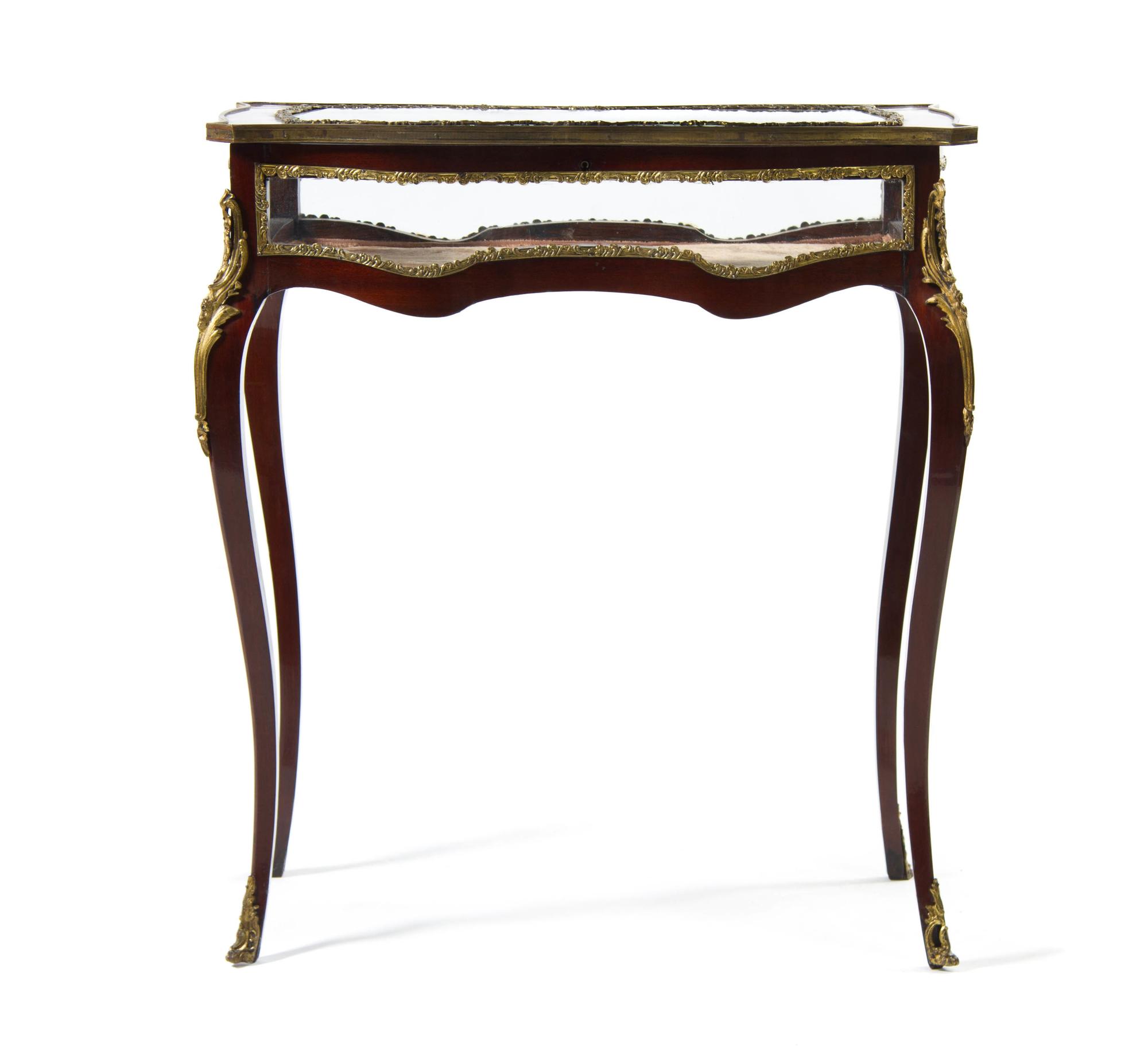 A French Transitional Style Gilt Metal Mounted Mahogany Vitrine Table, Height 33 1/8 x width 29 3/4 x depth 18 1/2 inches.