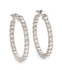 A Pair of White Gold and Diamond Hoop Earclips, 9.70 dwts.