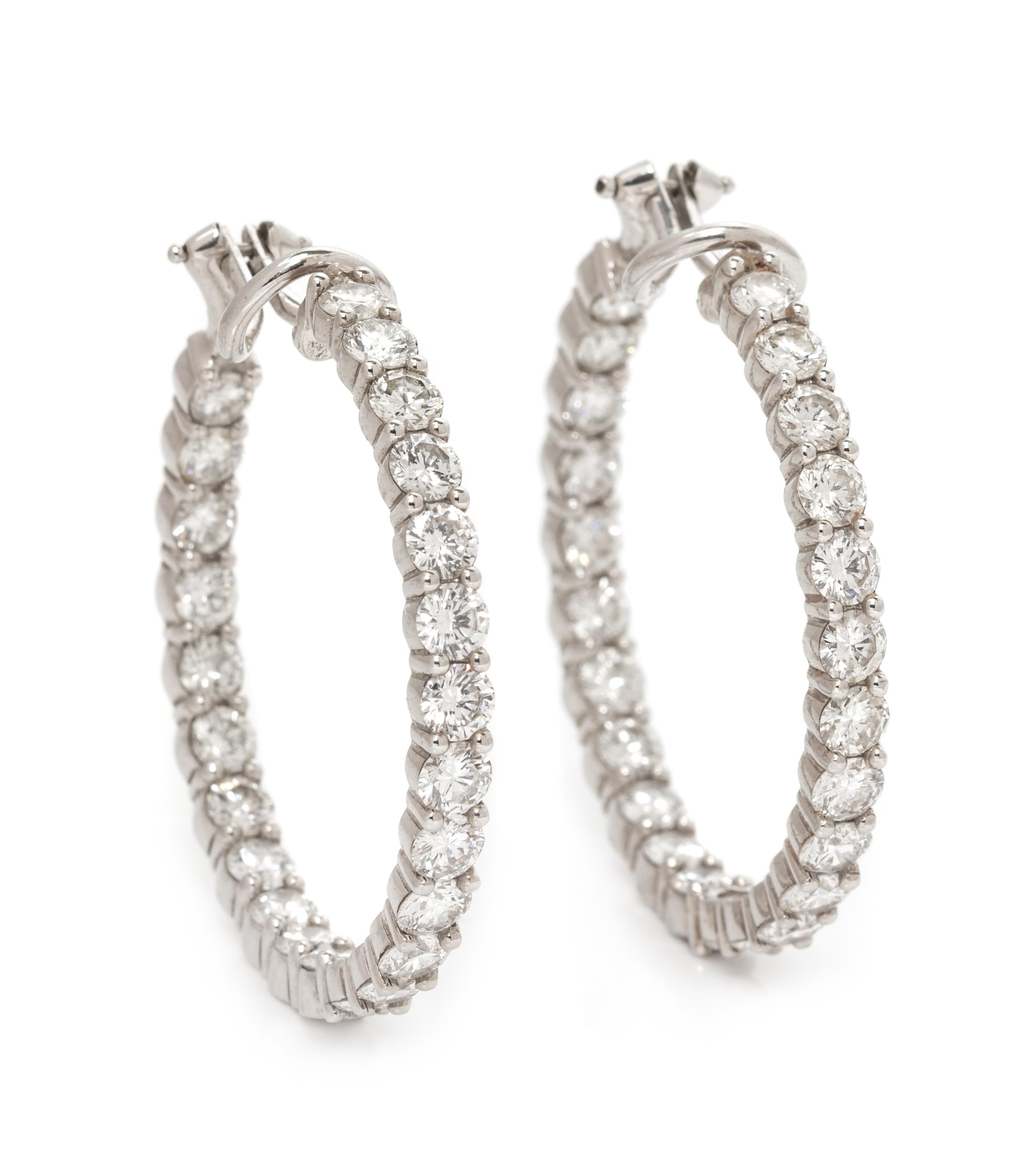 A Pair of White Gold and Diamond Hoop Earclips, 9.70 dwts.