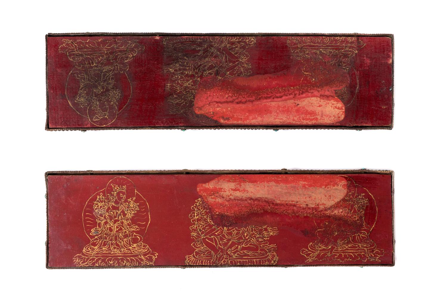 A Pair of Tibetan Parcel-Gilt and Silvered Manuscript Covers