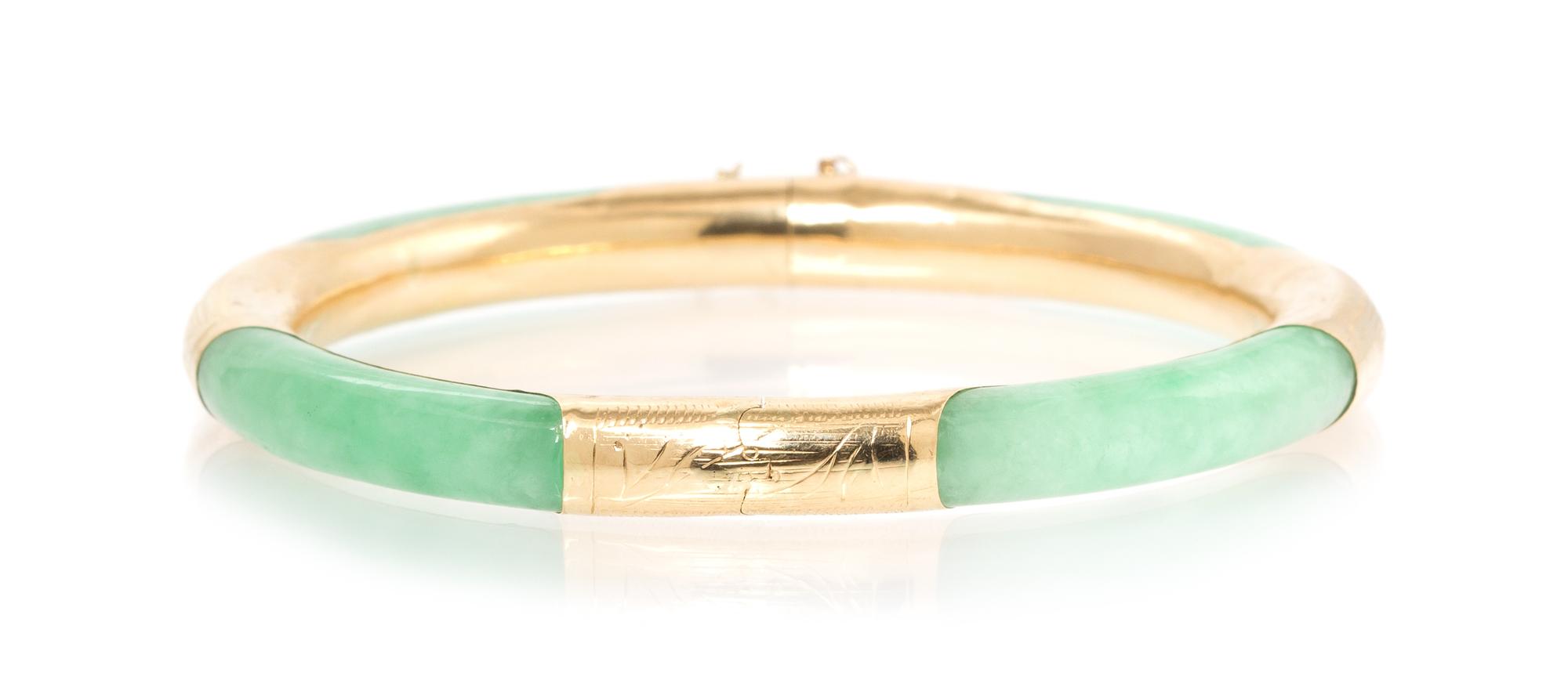 A 14 Karat Yellow Gold and Jadeite Bangle Bracelet, 13.75 dwts.