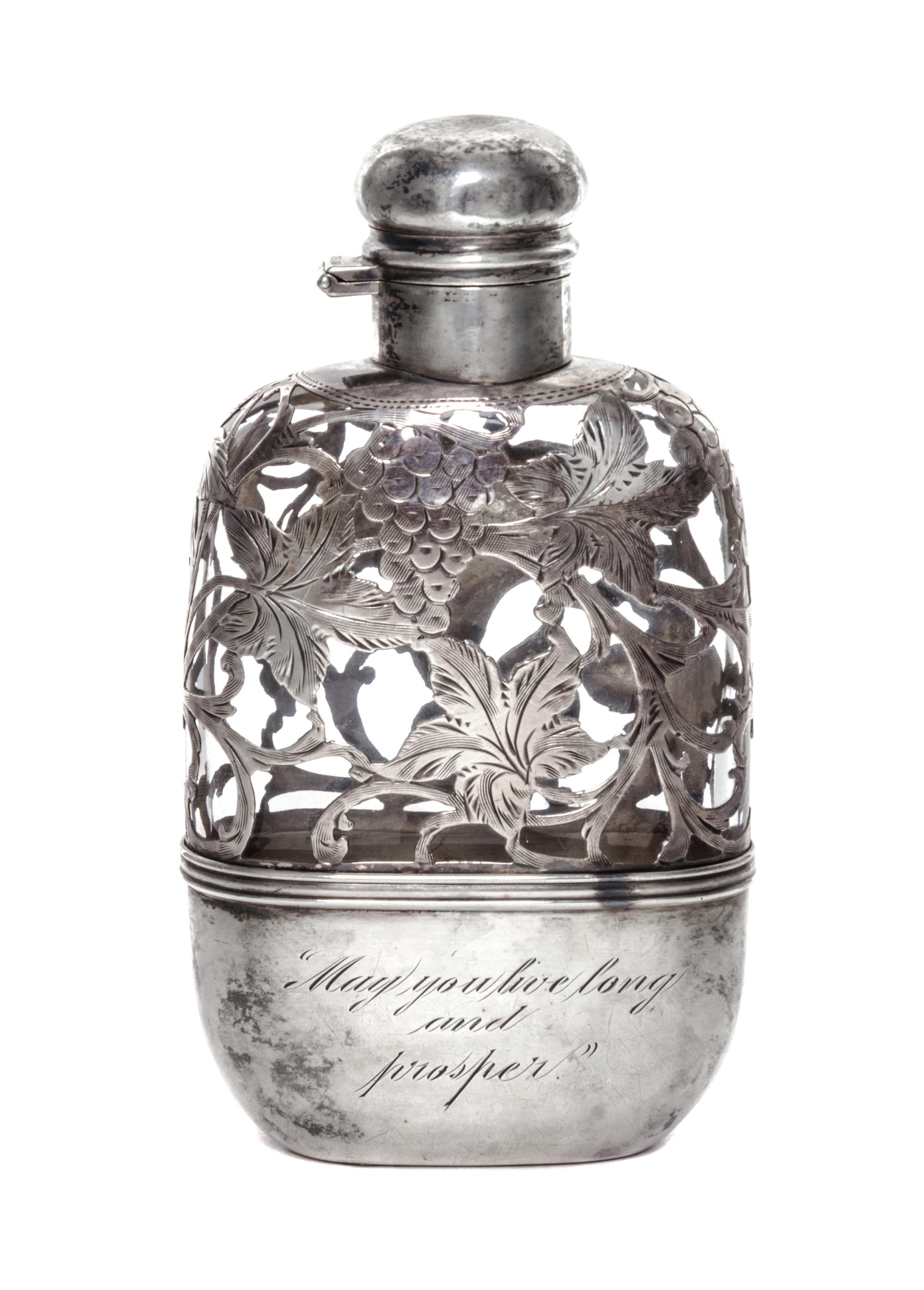 An American Silver Overlay Glass Flask, Alvin Manufacturing Corp., Providence, RI, Early 20th Century, of flattened form with hinged tw