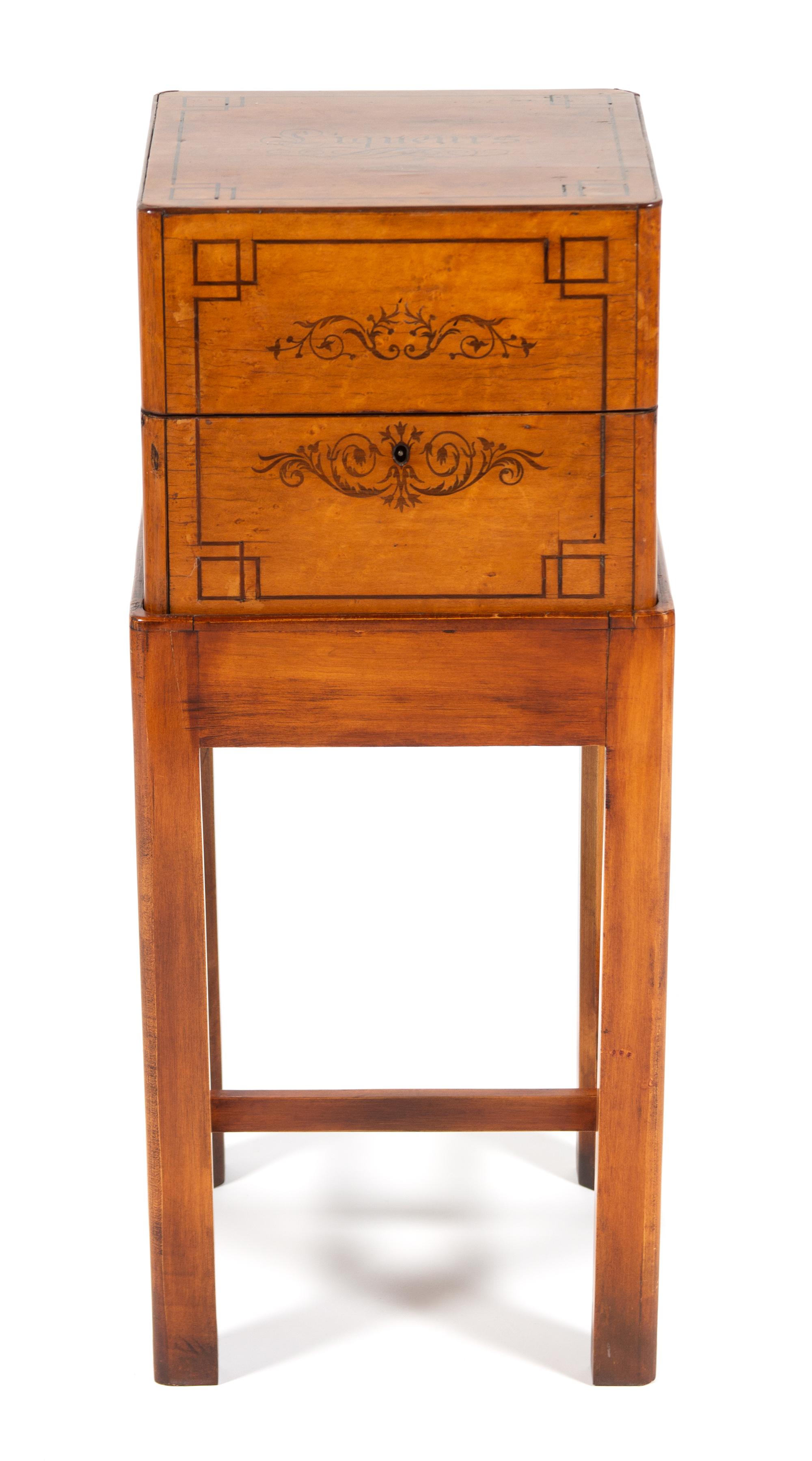 A Charles X Style Birds-Eye Maple Liqueur Chest on Stand Height 29 1/2 x width 12 3/4 x depth 12 3/4 inches. — 19TH CENTURY