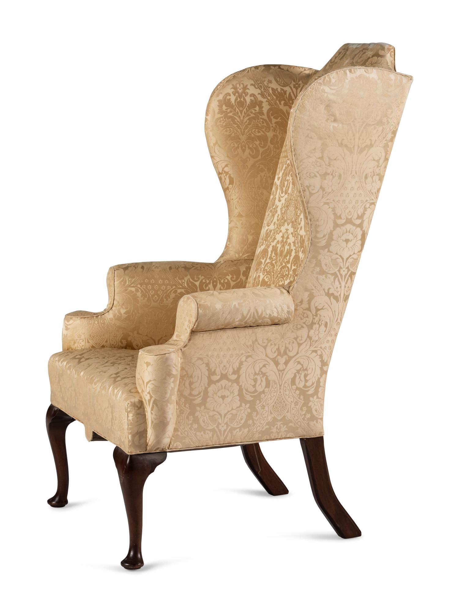 A Queen Anne Style Upholstered Pad Foot Easy Chair
