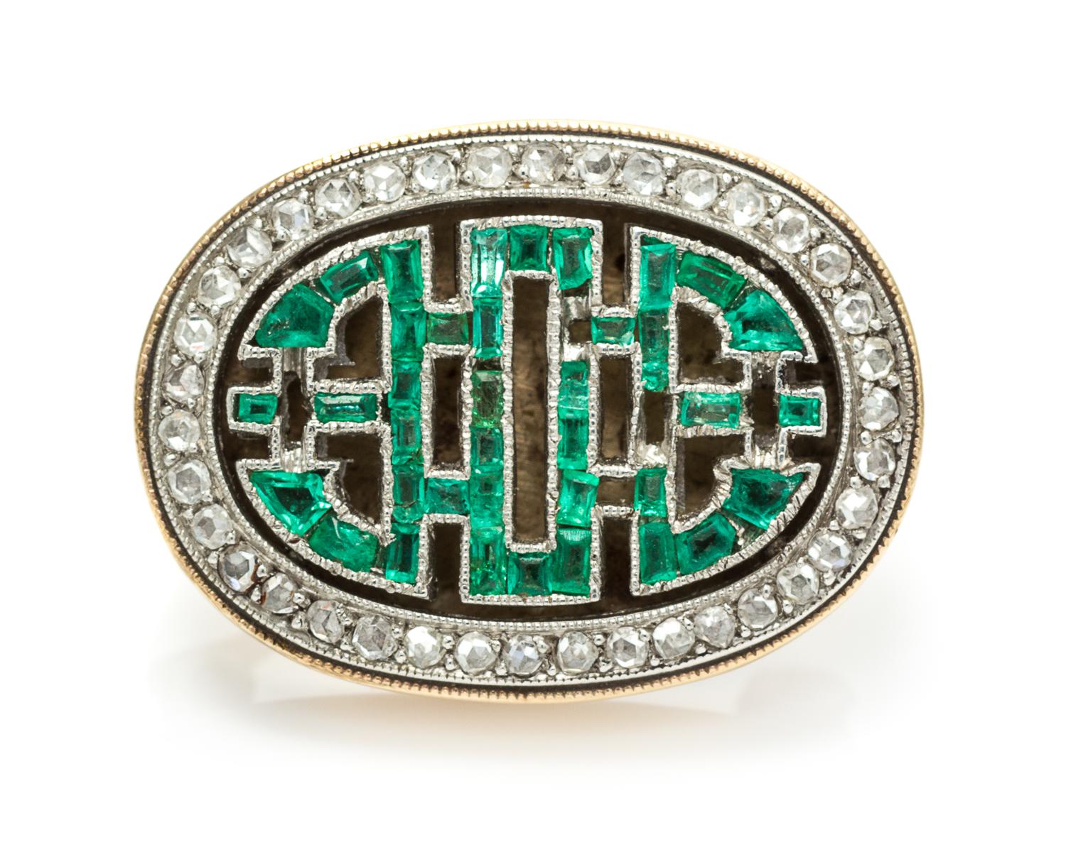 A Platinum Topped Gold, Emerald and Diamond Pin, 4.70 dwts.