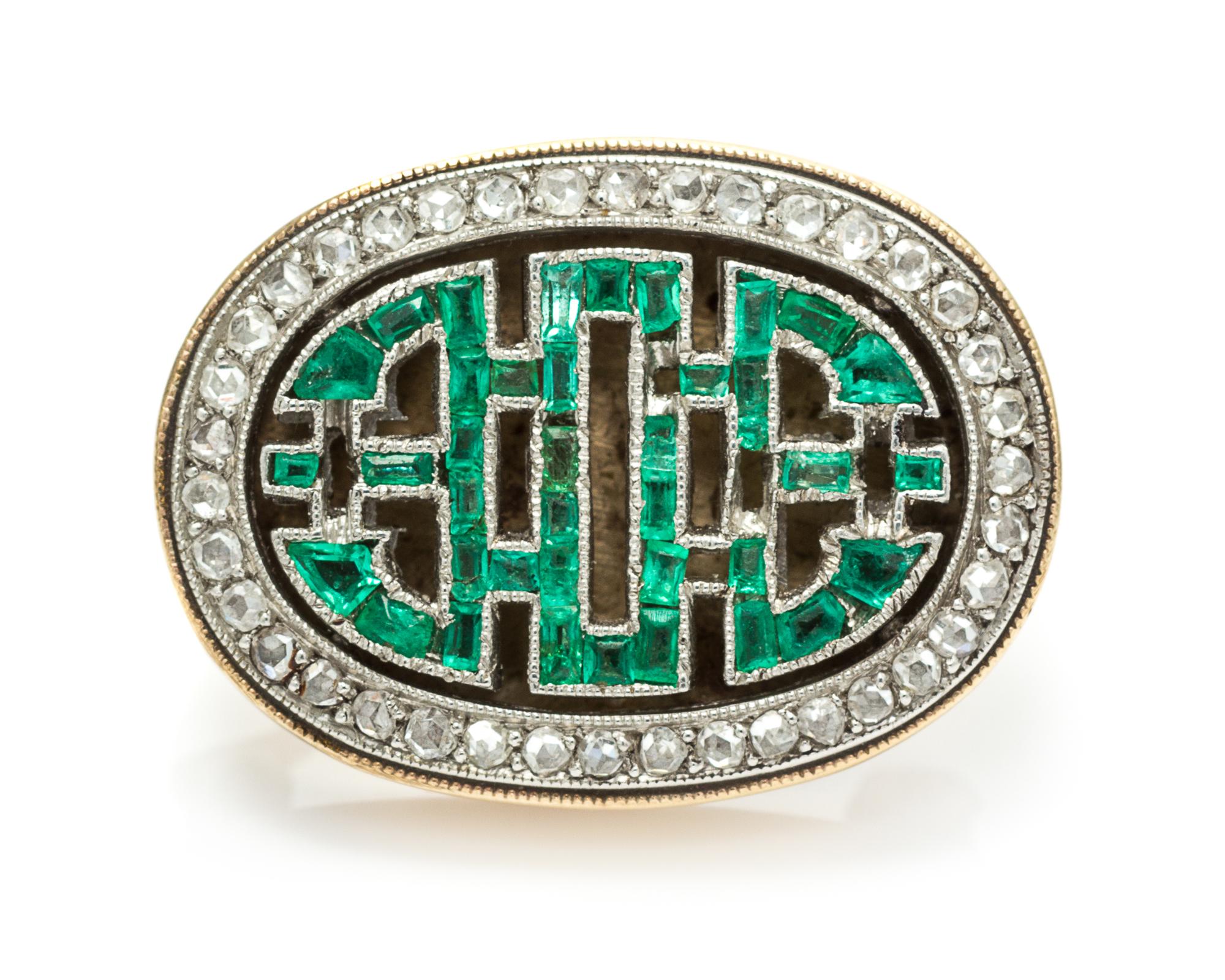 A Platinum Topped Gold, Emerald and Diamond Pin, 4.70 dwts.