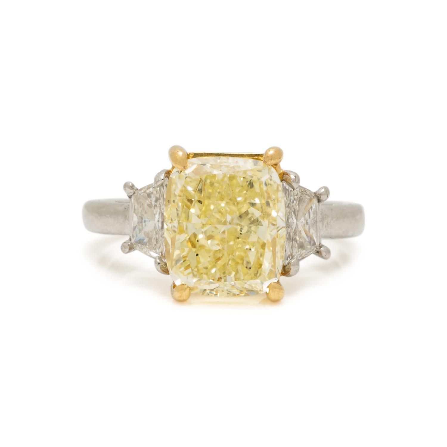 FANCY LIGHT YELLOW DIAMOND AND DIAMOND RING