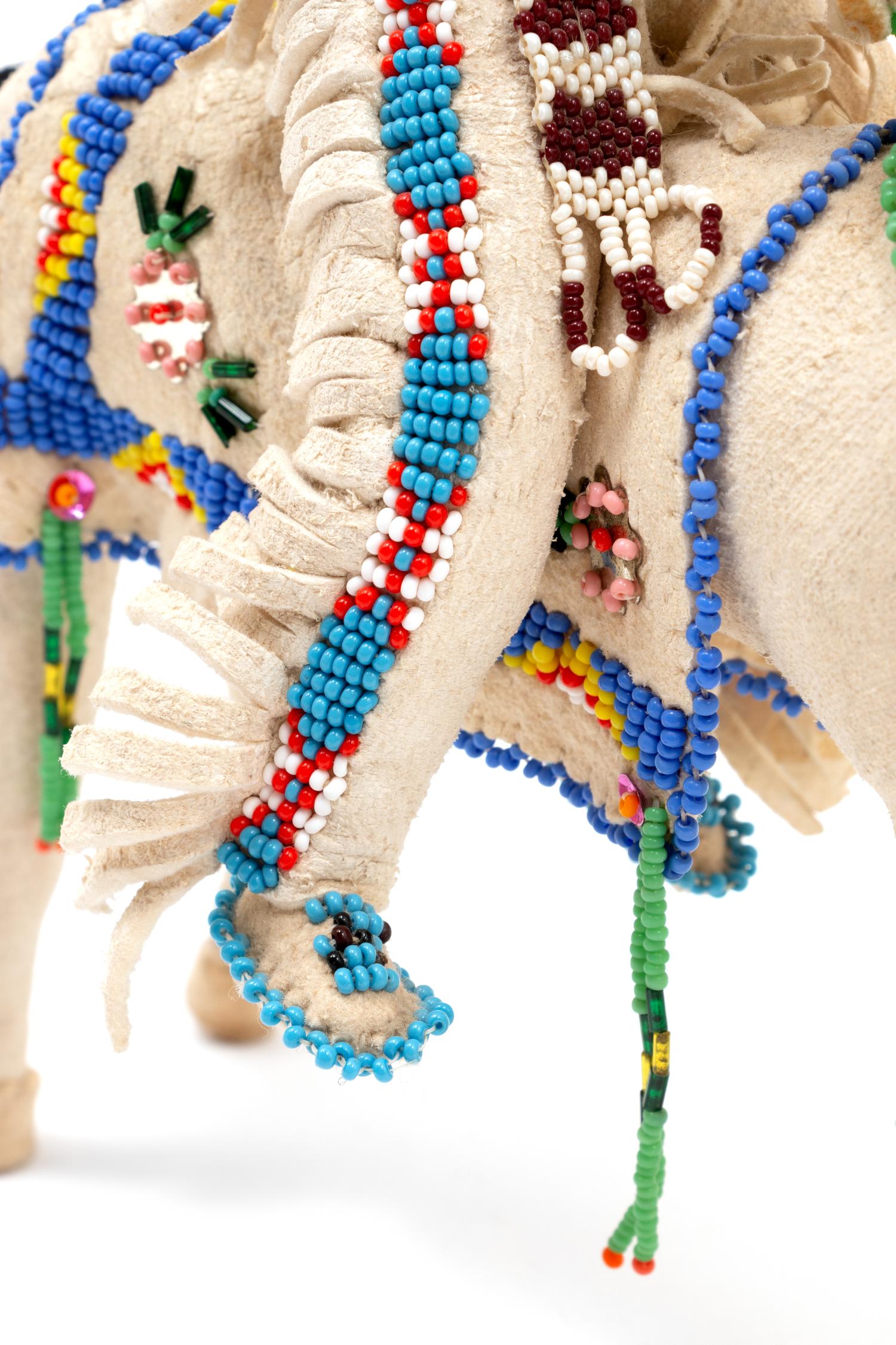 Plateau Beaded Hide Dolls, on Horseback